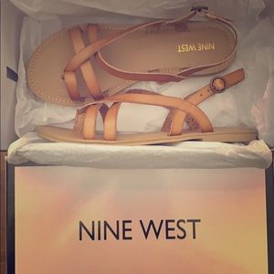 Light brown, flat, straps sandals.